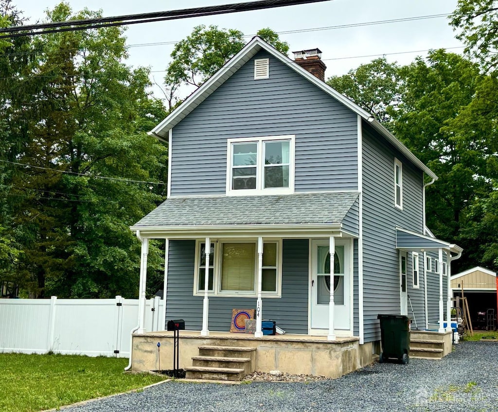 104 Old Matawan Rd, Old Bridge, NJ 08857 - view of front of house featuring covered porch, a chimney, and roof with shingles