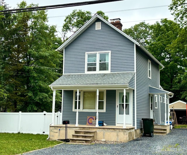 104 Old Matawan Rd, Old Bridge, NJ 08857 - view of front of house featuring covered porch, a chimney, and roof with shingles