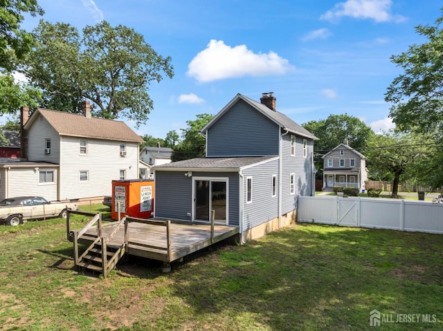 104 Old Matawan Rd, Old Bridge, NJ 08857 - back of property with a wooden deck and a gate