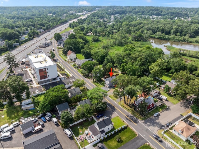 104 Old Matawan Rd, Old Bridge, NJ 08857 - aerial overview of property's location featuring a forest and a large body of water