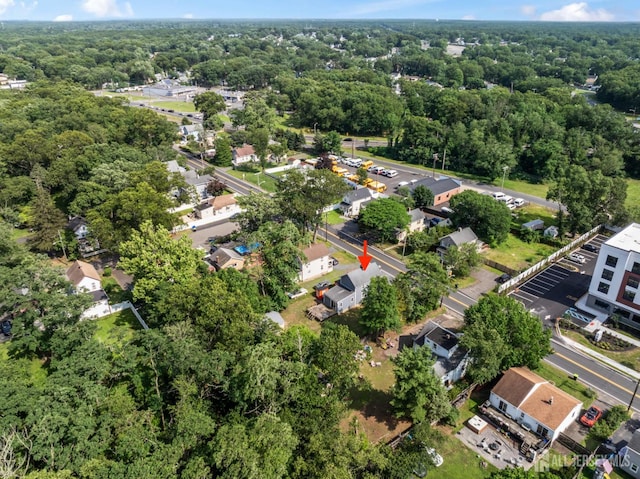 104 Old Matawan Rd, Old Bridge, NJ 08857 - aerial overview of property's location with a heavily wooded area