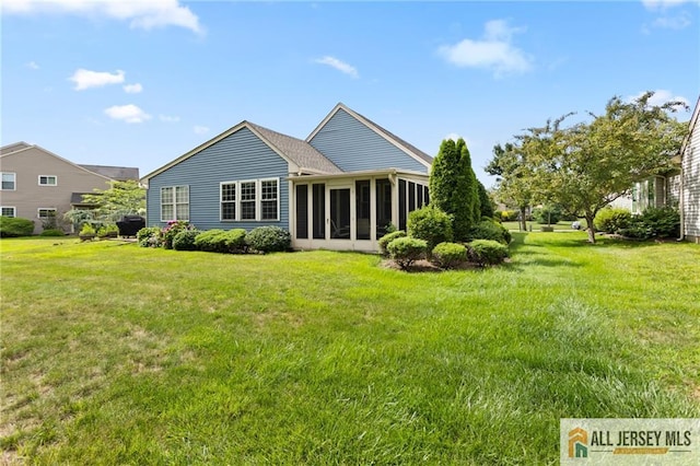 29 Ethan Allen Dr Unit B, Monroe, NJ 08831 - rear view of property featuring a lawn and a sunroom