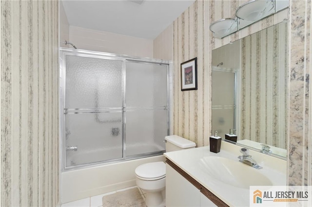 29 Ethan Allen Dr Unit B, Monroe, NJ 08831 - full bathroom with wallpapered walls, vanity, enclosed tub / shower combo, and tile patterned flooring