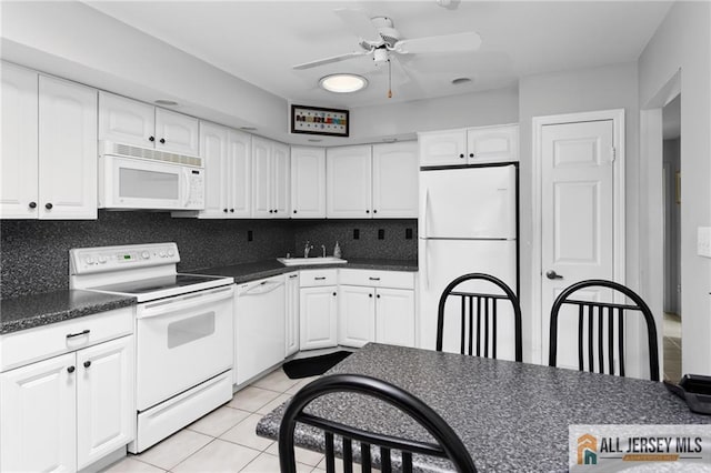 29 Ethan Allen Dr Unit B, Monroe, NJ 08831 - kitchen with white appliances, dark countertops, white cabinetry, and ceiling fan