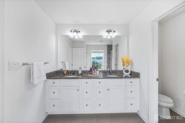 18 Larkspur Ln, Monroe, NJ 08831 - full bathroom with double vanity, tile patterned floors, and a shower