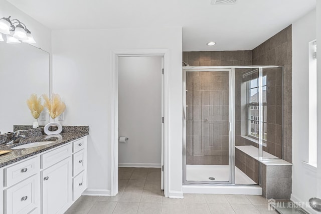 18 Larkspur Ln, Monroe, NJ 08831 - bathroom featuring vanity, tile patterned flooring, a stall shower, and recessed lighting
