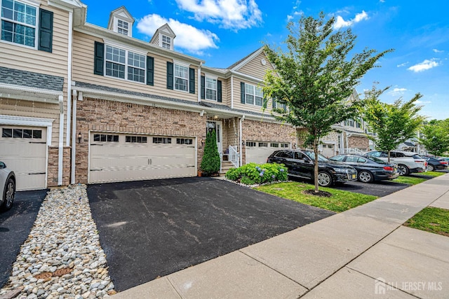 18 Larkspur Ln, Monroe, NJ 08831 - view of property featuring a garage and driveway
