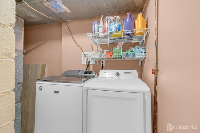 laundry area with separate washer and dryer