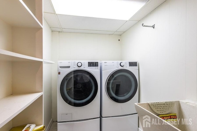 laundry room featuring separate washer and dryer