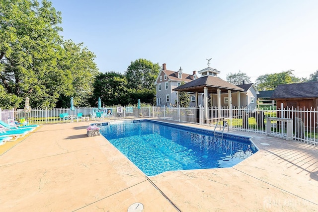 234 W Church St, Gloucester Twp, NJ 08012 - view of pool featuring a fenced in pool, a patio area, fence, and a gazebo