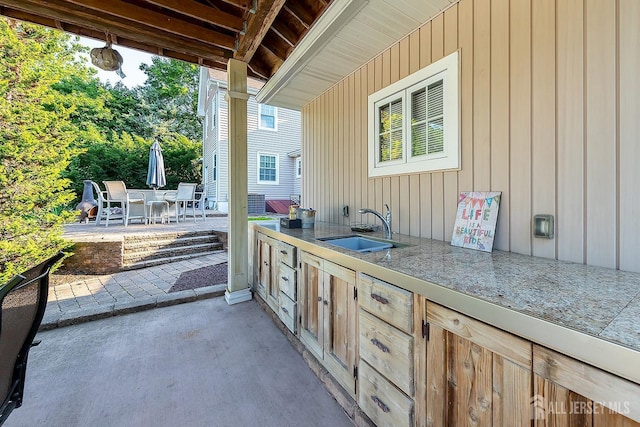 234 W Church St, Gloucester Twp, NJ 08012 - view of patio featuring outdoor dining space, a sink, and area for grilling