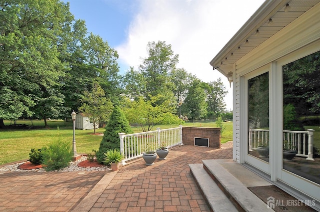 1329 Crown Ln, South Plainfield, NJ 07080 - view of patio / terrace with a storage shed