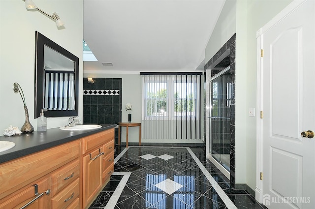 1329 Crown Ln, South Plainfield, NJ 07080 - bathroom with double vanity, inlaid floor details, a stall shower, and marble tiled floors