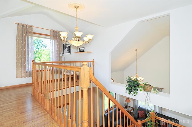 1329 Crown Ln, South Plainfield, NJ 07080 - stairway with a chandelier, lofted ceiling, and wood finished floors