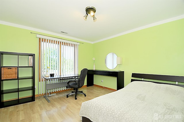 1329 Crown Ln, South Plainfield, NJ 07080 - bedroom with crown molding and wood finished floors