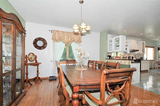 1329 Crown Ln, South Plainfield, NJ 07080 - dining room with plenty of natural light, a chandelier, recessed lighting, and hardwood / wood-style flooring