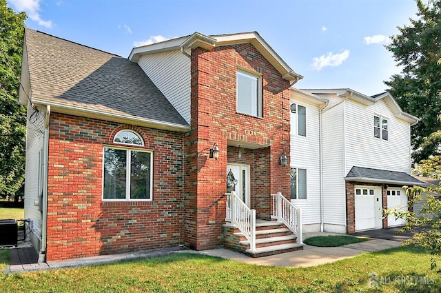 1329 Crown Ln, South Plainfield, NJ 07080 - traditional-style house with a garage, brick siding, and driveway