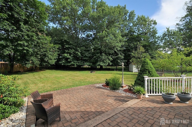 1329 Crown Ln, South Plainfield, NJ 07080 - fenced backyard with a patio and a shed