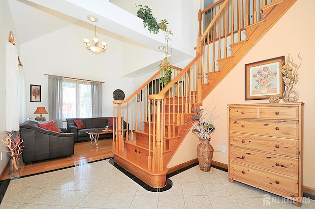 1329 Crown Ln, South Plainfield, NJ 07080 - stairs with a towering ceiling and a chandelier