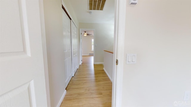 hall featuring light hardwood / wood-style flooring