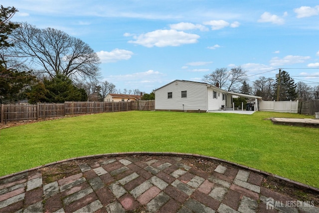 view of yard with a patio area