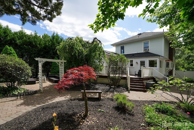 369 N Main St, Milltown, NJ 08850 - rear view of house featuring a patio area, a deck, and a pergola