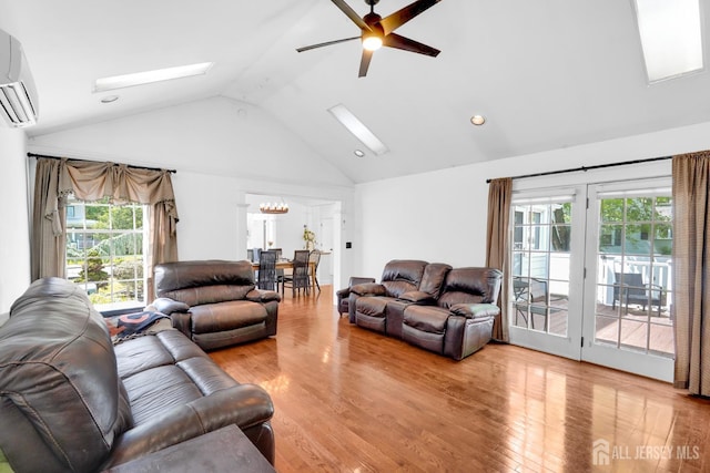 369 N Main St, Milltown, NJ 08850 - living area featuring a skylight, ceiling fan, healthy amount of natural light, light wood-style floors, and high vaulted ceiling