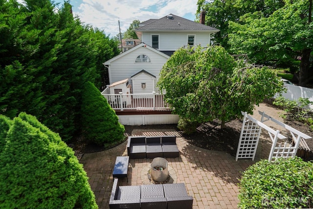 369 N Main St, Milltown, NJ 08850 - back of house with a patio and a chimney