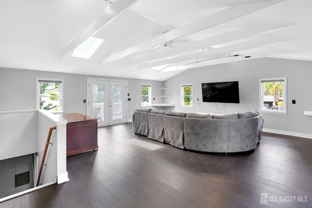 369 N Main St, Milltown, NJ 08850 - living area featuring a skylight, dark wood-style flooring, and french doors