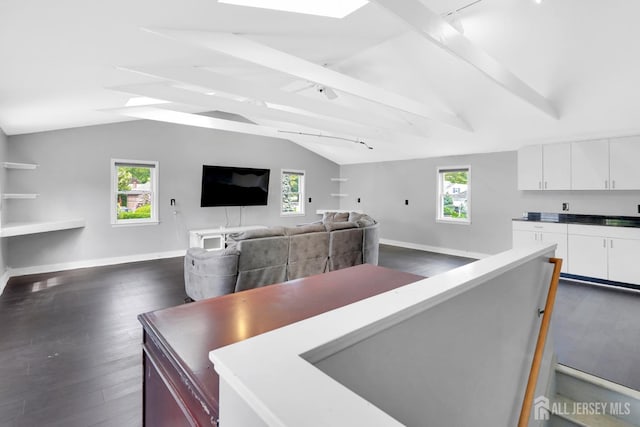 369 N Main St, Milltown, NJ 08850 - living area with dark wood-style floors and healthy amount of natural light