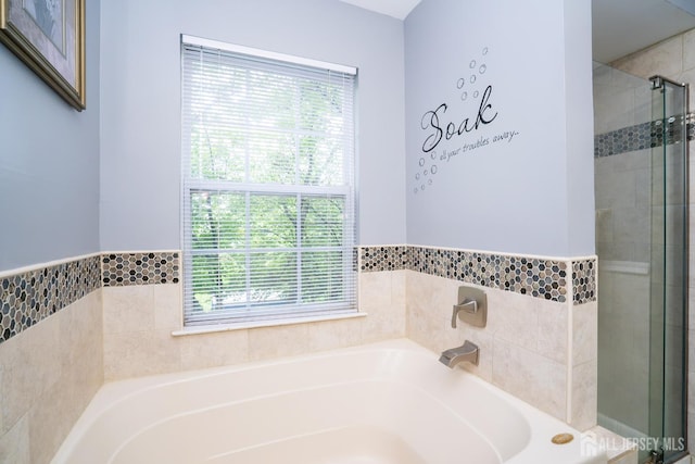 108 Jared Dr, North Brunswick, NJ 08902 - bathroom featuring healthy amount of natural light, a bath, and a stall shower