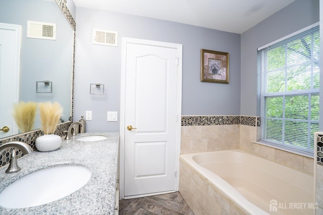 108 Jared Dr, North Brunswick, NJ 08902 - bathroom with a garden tub and double vanity