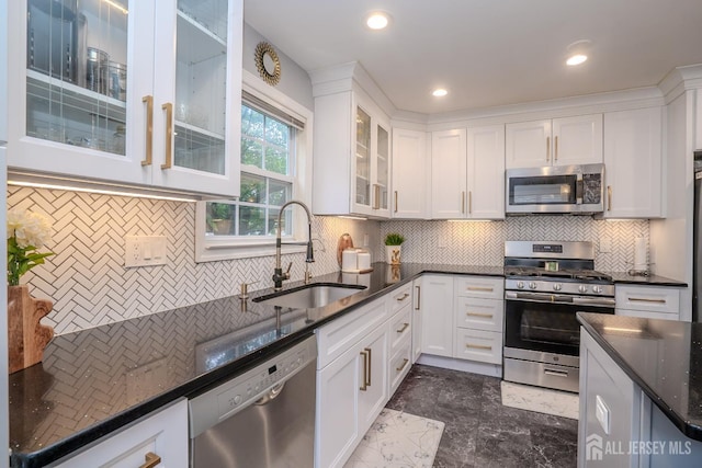 108 Jared Dr, North Brunswick, NJ 08902 - kitchen with appliances with stainless steel finishes, tasteful backsplash, white cabinetry, and recessed lighting