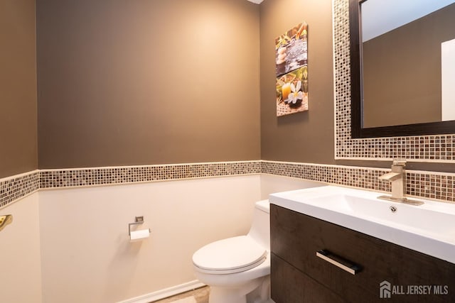 108 Jared Dr, North Brunswick, NJ 08902 - bathroom featuring vanity and tasteful backsplash