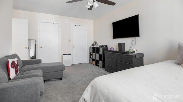 carpeted bedroom with a ceiling fan