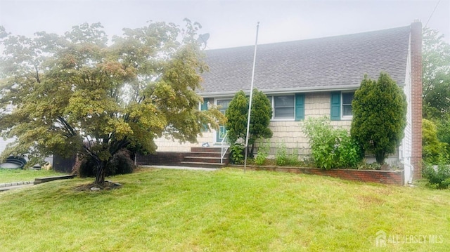 18 Westbury Rd, Iselin, NJ 08830 - view of front facade featuring roof with shingles and a front lawn