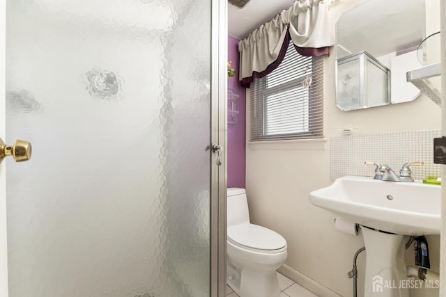 10 Denman Dr, Fords, NJ 08863 - full bathroom featuring a shower stall, tile patterned flooring, and backsplash