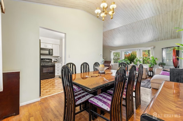 10 Denman Dr, Fords, NJ 08863 - dining space with vaulted ceiling, a chandelier, and light wood finished floors