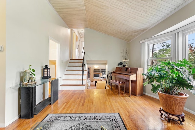 10 Denman Dr, Fords, NJ 08863 - living area featuring lofted ceiling, wood finished floors, wood ceiling, and stairway