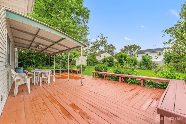 10 Denman Dr, Fords, NJ 08863 - wooden terrace featuring outdoor dining space and a fenced backyard