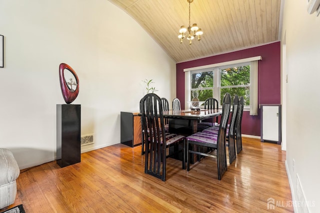 10 Denman Dr, Fords, NJ 08863 - dining area featuring a chandelier, vaulted ceiling, light wood-type flooring, and wood ceiling