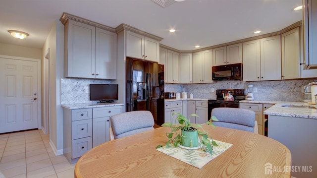 741-B Nautilus Ct Unit B, Monroe, NJ 08831 - kitchen featuring black appliances, a sink, light tile patterned floors, backsplash, and recessed lighting