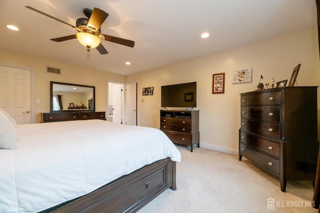 bedroom with recessed lighting, light carpet, a ceiling fan, baseboards, and visible vents