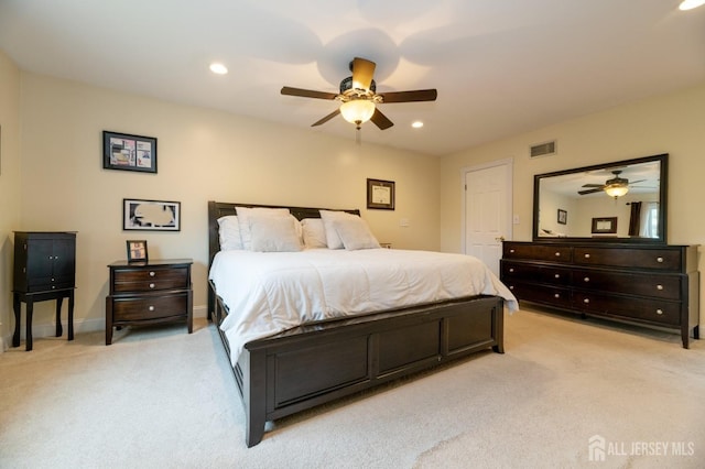 bedroom with light carpet, ceiling fan, visible vents, and recessed lighting