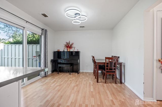 58 La Rue Ln, East Brunswick, NJ 08816 - dining room featuring light wood-type flooring and baseboards