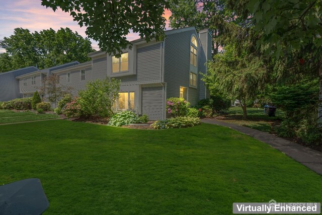 58 La Rue Ln, East Brunswick, NJ 08816 - view of front of property with a chimney and a lawn