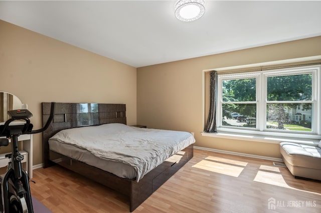 58 La Rue Ln, East Brunswick, NJ 08816 - bedroom with wood finished floors and baseboards