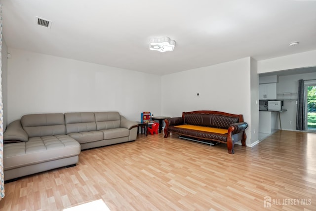 58 La Rue Ln, East Brunswick, NJ 08816 - living room with light wood-style floors