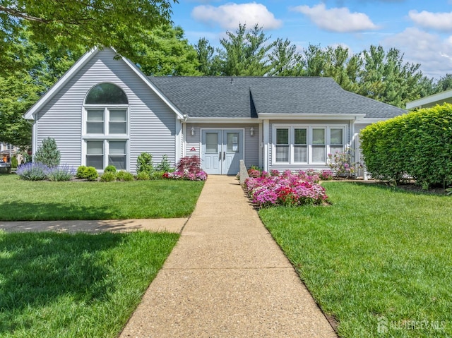 58 La Rue Ln, East Brunswick, NJ 08816 - ranch-style home with a front lawn and a shingled roof