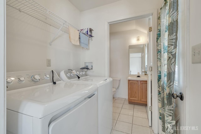 136 Carroll Ave, Woodbridge Proper, NJ 07095 - washroom featuring separate washer and dryer and light tile patterned floors